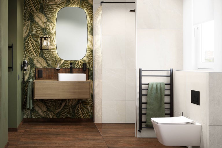 Badezimmer mit Waschtisch, Spiegel, Dusche, Heizkörper und Toilette.