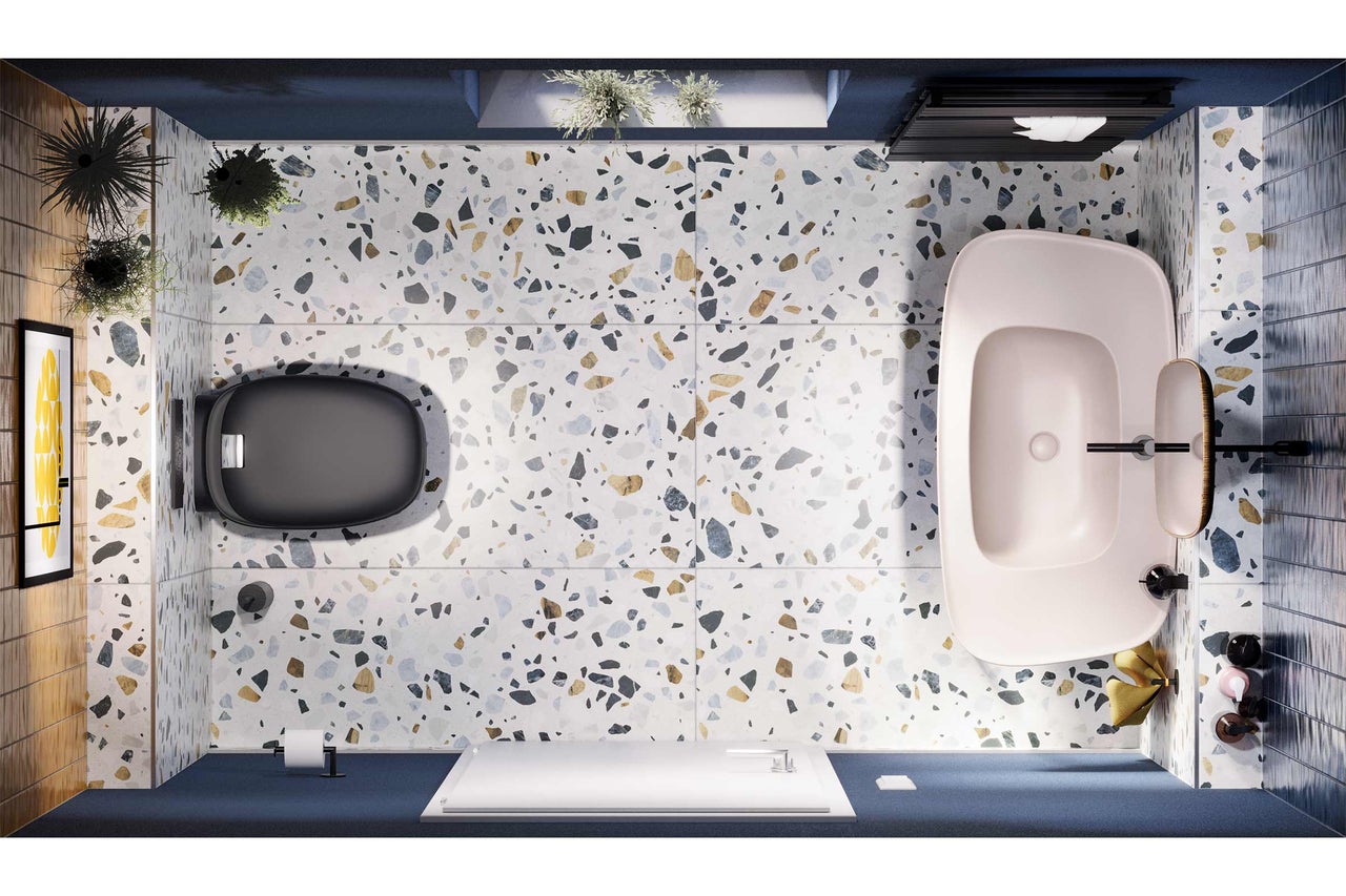 Badezimmer mit Toilette, Badewanne und Terrazzoboden aus der Vogelperspektive