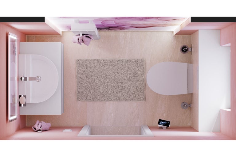 Vogelperspektive eines Badezimmers mit Waschbecken, Toilette, Badewanne und Badteppich