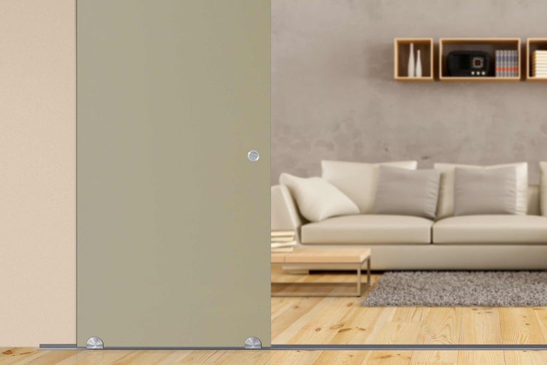 Schiebetür aus Glas in einem Wohnzimmer