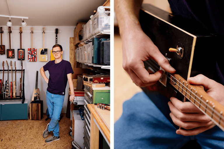 Mann in Werkstatt mit selbstgebauten Gitarren und spielender Person auf Zigarrenkistengitarre