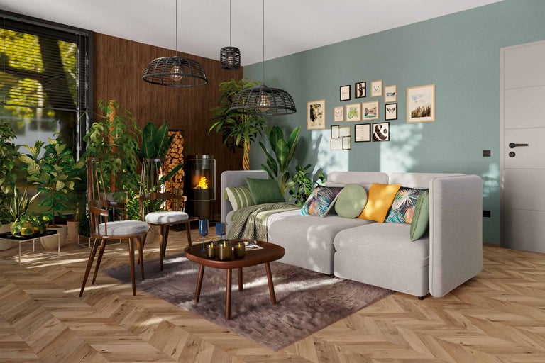 Wohnzimmer mit Sofa, Couchtisch, Kaminofen und Dekorationen für ein gemütliches Ambiente