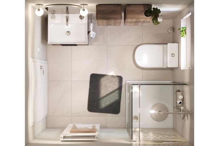 Vogelperspektive eines Badezimmers mit Waschbecken, Toilette, Dusche und Badematte