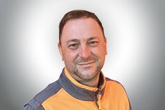 Porträt eines Mannes in Arbeitskleidung