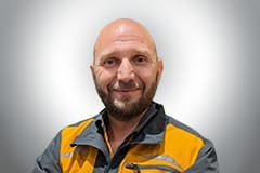 Porträt eines Mannes in Arbeitskleidung