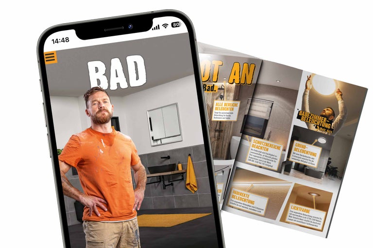 Ein Smartphone zeigt eine Badausstellung und eine Broschüre über Badezimmerbeleuchtung.