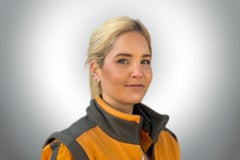 Porträt einer Frau in Arbeitskleidung