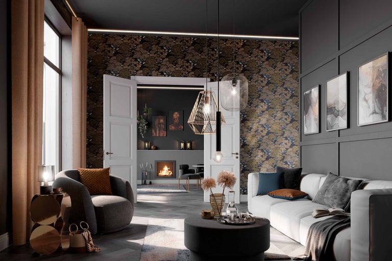 Wohnzimmer mit Sofa, Sessel, Beleuchtung und Dekoration