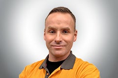 Porträt eines Mannes in Arbeitskleidung