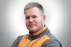 Porträt eines Mannes in Arbeitskleidung