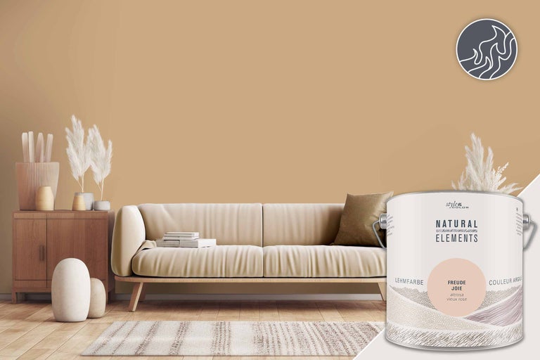 Beispiel eines Wohnzimmers in Sandfarben mit einem Farbdosenmotiv