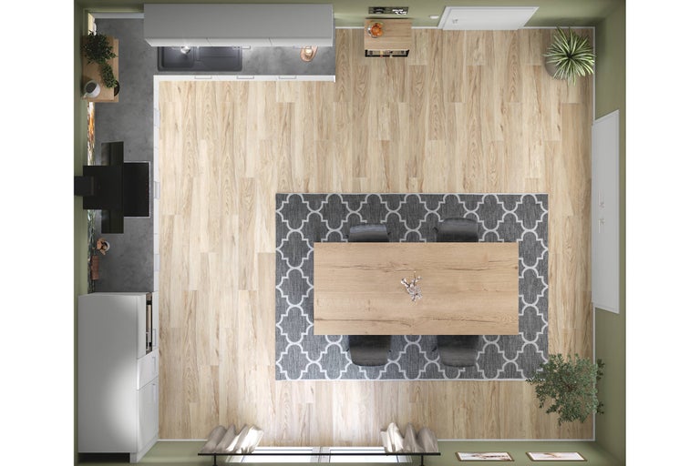 Draufsicht eines Wohnraums mit Esstisch auf Teppich, Holzboden und Küchenbereich