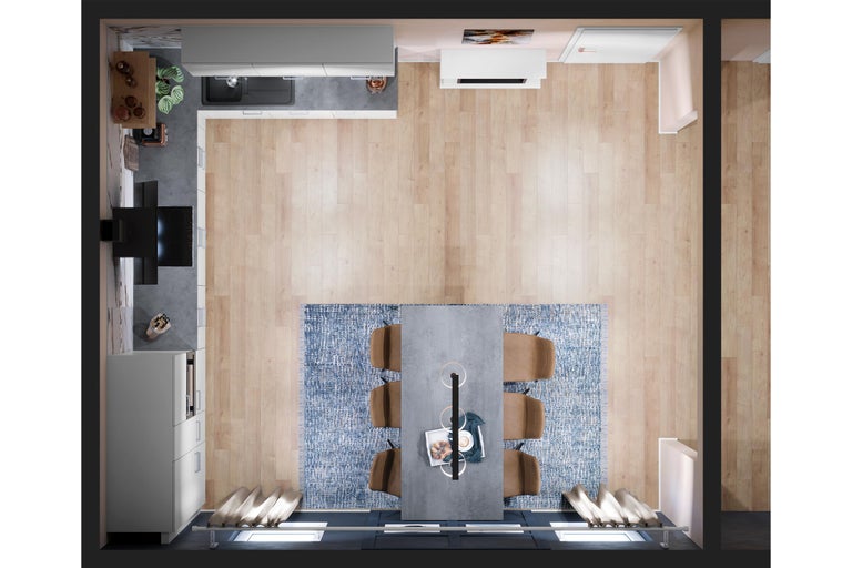 Innenraumansicht von oben: Küche, Esszimmer mit Esstisch, Stühlen und Teppich