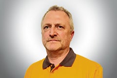 Porträt eines Mannes in Arbeitskleidung