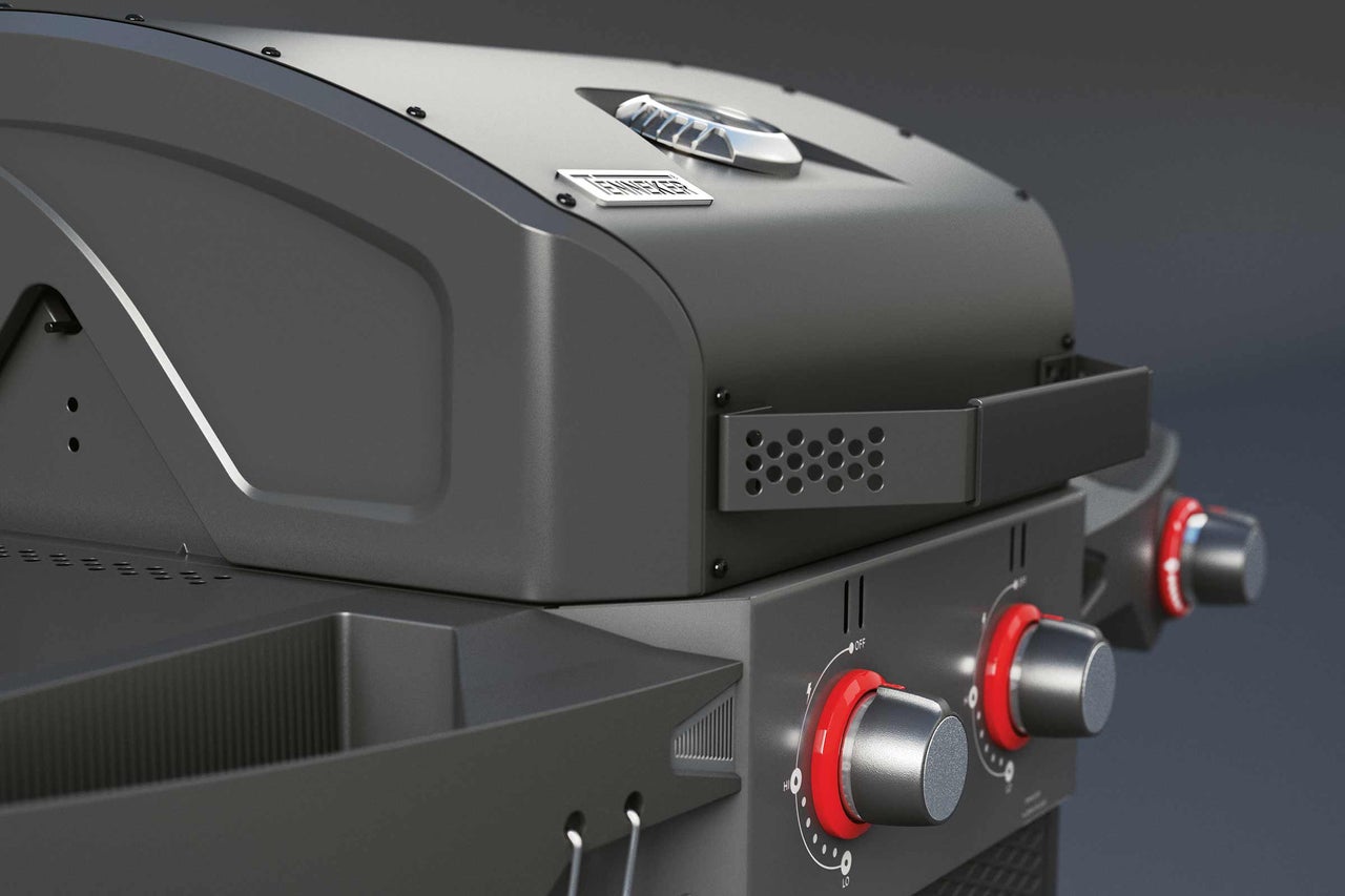 Detailansicht eines Gasgrills mit Einstellknöpfen und Warmhalterost