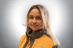 Porträt einer Frau in Arbeitskleidung