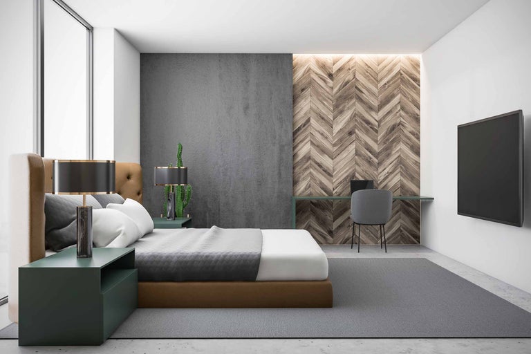 Schlafzimmer mit Bett, Schreibtisch und Fernseher an der Wand