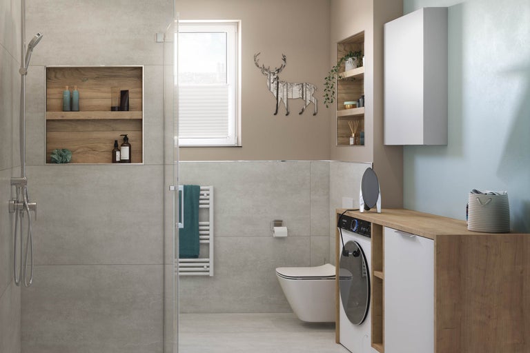 Modernes Badezimmer mit Dusche, Toilette, Waschtisch, Waschmaschine und dekorativen Elementen