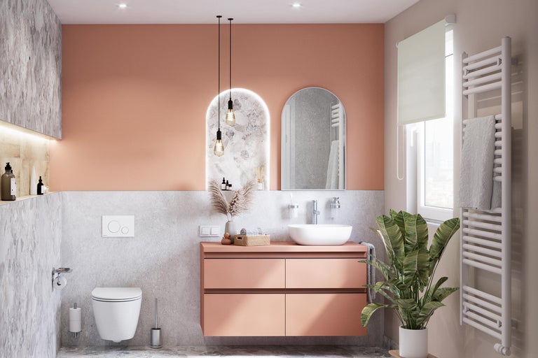 Modernes Badezimmer mit Waschtisch, Spiegel, Heizkörper und Toilette für eine stilvolle Einrichtung