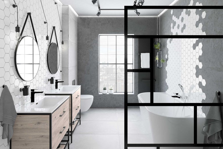 Badezimmer mit Doppelwaschtisch, freistehender Badewanne und sechseckigen Fliesen