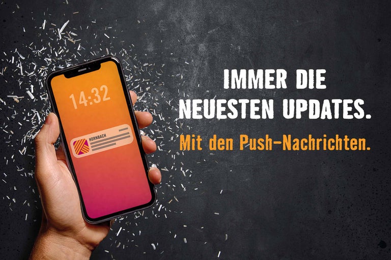 Smartphone mit Nachricht auf dem Display, daneben der Text „Immer die neusten Updates. Mit den Push-Nachrichtien.“