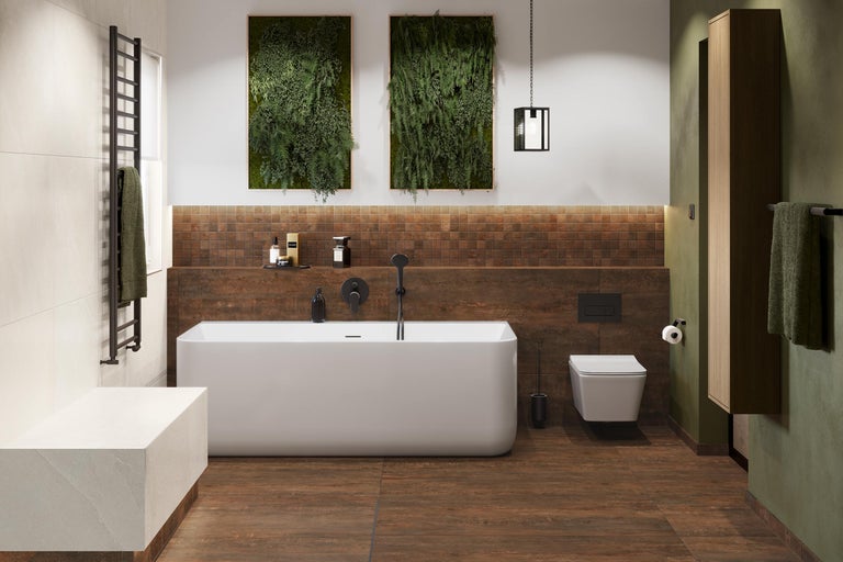 Helles Badezimmer mit Badewanne, Toilette, Waschtisch und Dekorationen