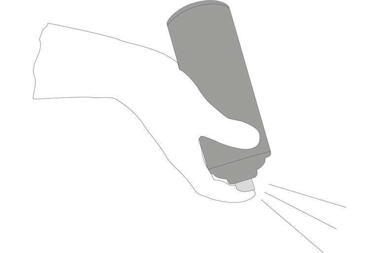 Hand hält Sprühdose
