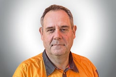 Porträt eines Mannes in Arbeitskleidung