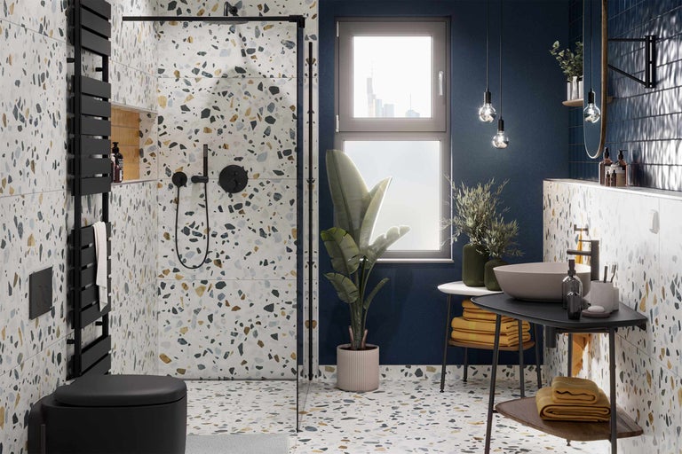Modernes Badezimmer mit Terrazzoboden und -wänden, Dusche, Toilette und Waschtisch
