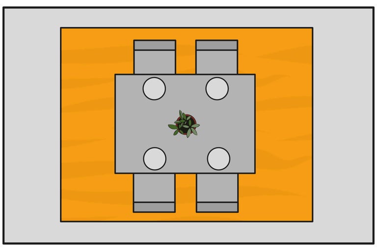 Draufsicht eines Essbereichs mit Tisch, Stühlen, Geschirr und einer Pflanze