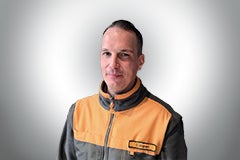 Porträt eines Mannes in Arbeitskleidung