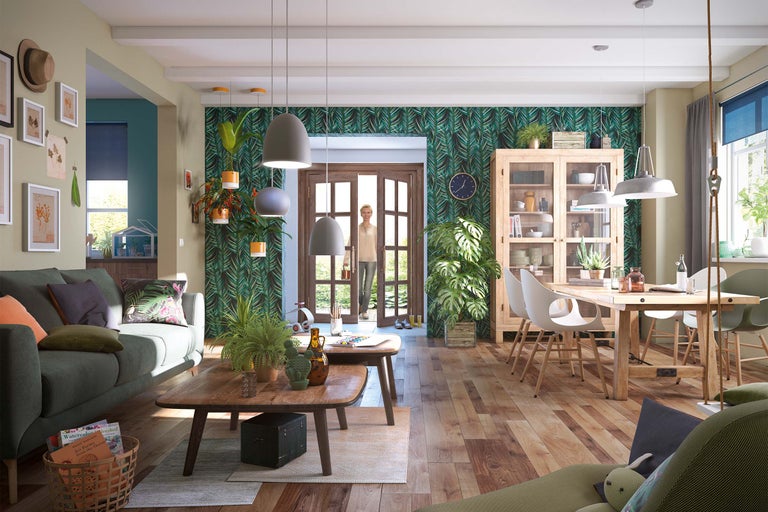 Wohnzimmer mit Sofa, Couchtisch, Esstisch und Dekorationsartikeln in einem Haus