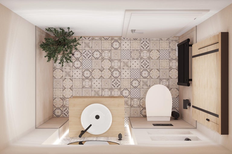 Badezimmer mit Toilette, Waschbecken, Fliesen und Heizkörper