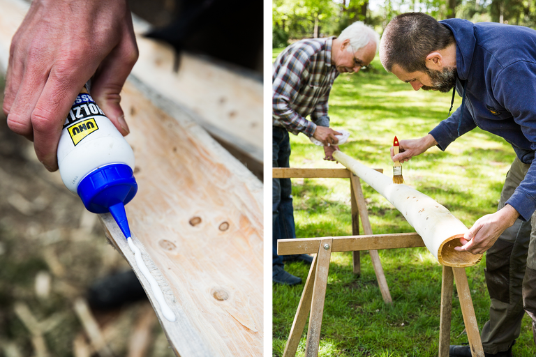 Handwerker tragen Holzleim auf Holz auf; zwei Männer bearbeiten ein hölzernes Didgeridoo im Freien.