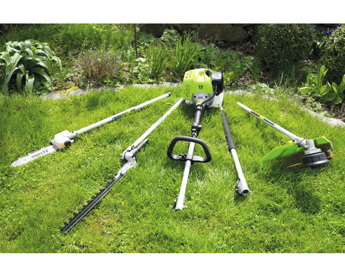 Mehrzweck-Gartengerät mit Kettensäge, Heckenschere und Rasentrimmer auf Rasen