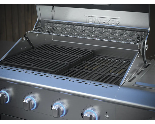 Geöffneter Gasgrill mit Grillrost und Warmhalterost