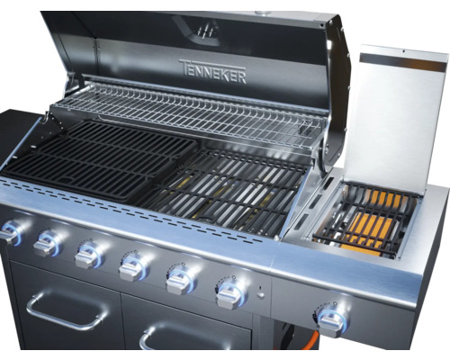Geöffneter Gasgrill mit Grillrosten und Warmhalterost