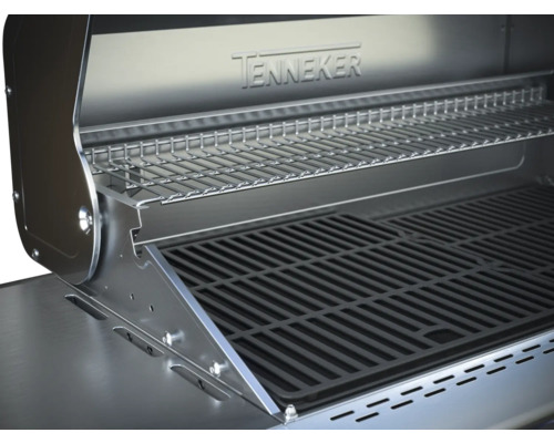 Innenansicht eines Gasgrills mit Grillrost und Warmhalterost