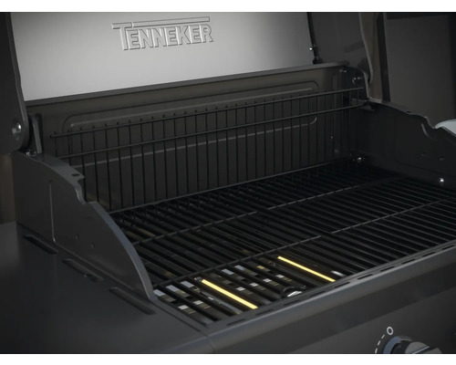 Innenansicht eines Tenneker Grills mit Grillrost und Warmhalterost