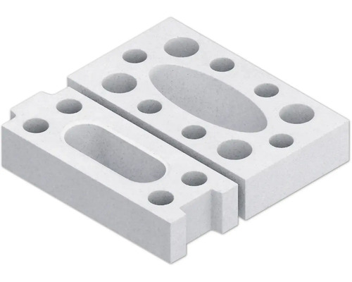 Zwei Porenbetonsteine mit Aussparungen