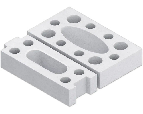 Zwei Porenbetonsteine mit Aussparungen