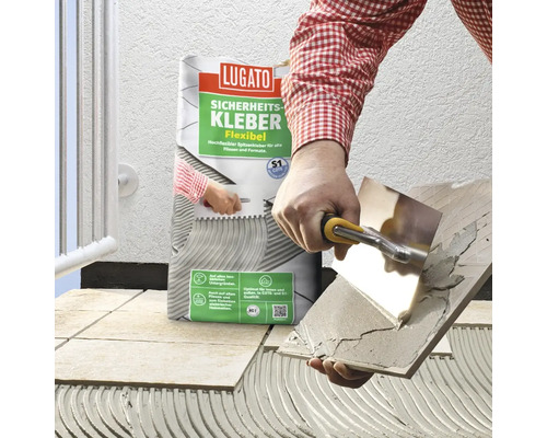 Anwendung von Lugato Sicherheitskleber Flexibel auf Fliesen.