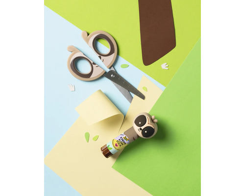 Kinderschere und Klebestift mit Faultier Design auf farbigem Papier