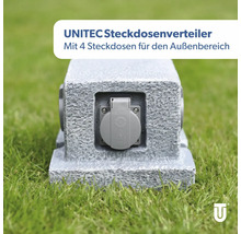 Unitec Steckdosenverteiler mit vier Steckdosen für den Außenbereich auf Rasen
