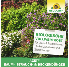 Neudorff Logo. Baum-, Strauch- und Heckendünger vor Pflanzen.