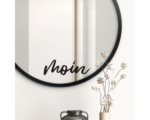 Runder Spiegel mit dem Schriftzug Moin, Vase mit Dekoration