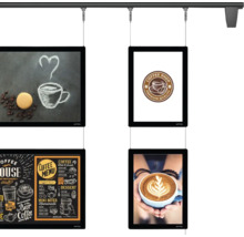 Hängendes Präsentationssystem mit vier hinterleuchteten Displays mit Kaffeemotiven