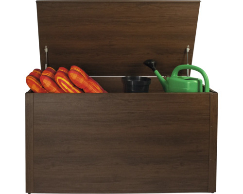 Geöffnete Aufbewahrungsbox mit Kissen, Gießkanne und Blumentopf