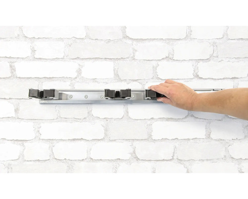 Wandhalterung für Stiele mit Hand