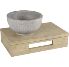 Graue Waschtischschale aus Stein auf einem Holzunterschrank